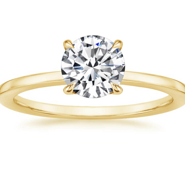 1.0CT Round Diamond Mounted In Yellow Gold Band